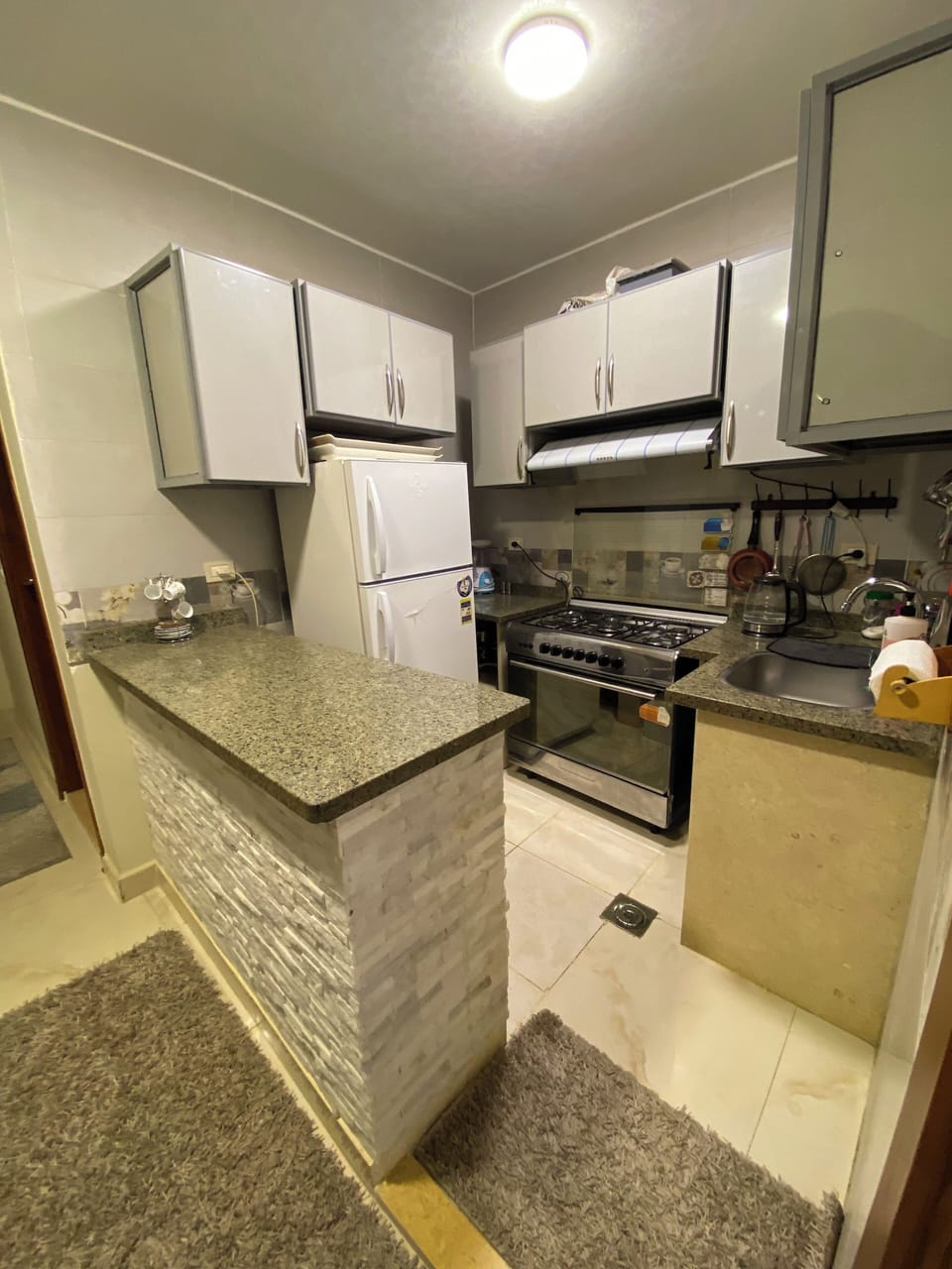 Mini-fridge, oven, dishwasher, coffee/tea maker