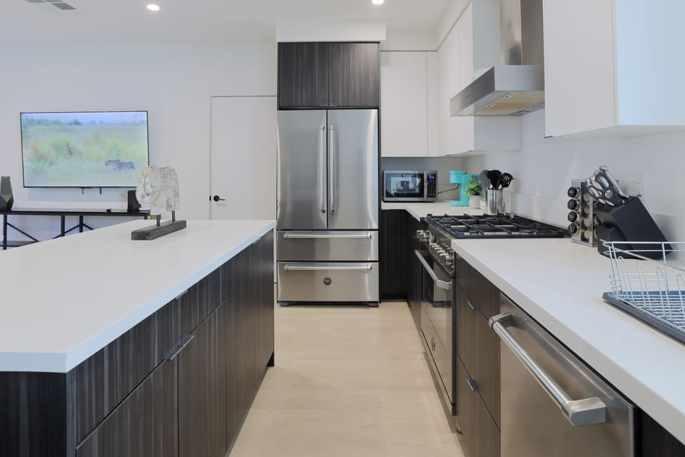 A sleek kitchen with stainless steel appliances