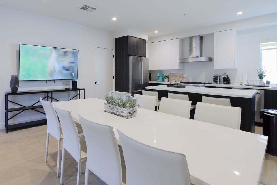 An elegant dining space with a designer table and chic chairs