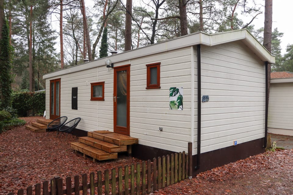 Chalet L2 has 3 steps up to the main entrance door and free parking on-site.