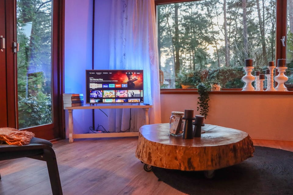Unwind in our cozy living room after a day of outdoor adventure! TV: Chromecast.