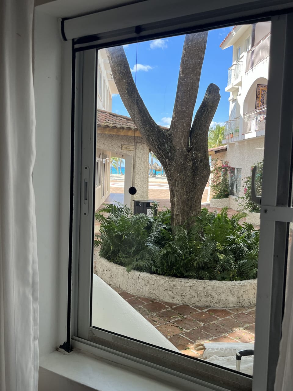 Window view to the beach from Master bedroom. 