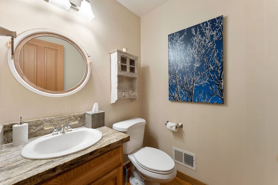 Shared half bath off the kitchen