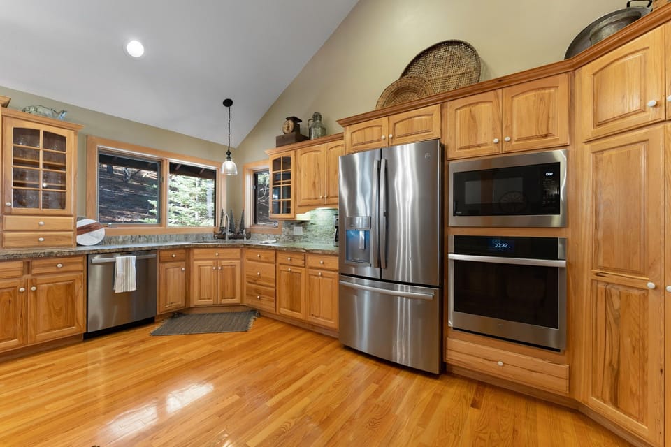 Open kitchen with stainless steel appliances