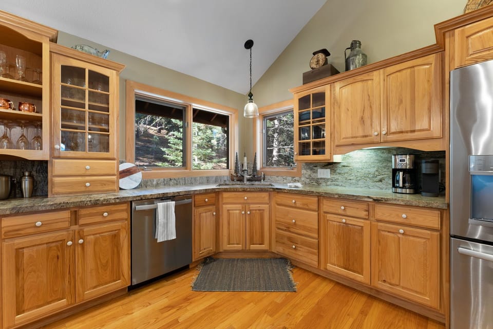 Kitchen sink with forest views