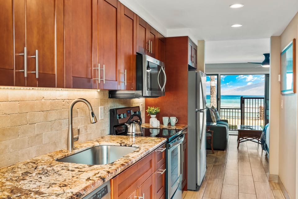 Gorgeous kitchen features granite countertops