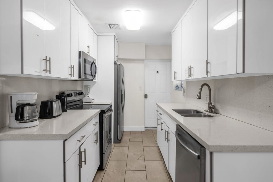 Comfort Room, Non Smoking, Air conditioning | Private kitchen | Full-size fridge, microwave, oven, stovetop