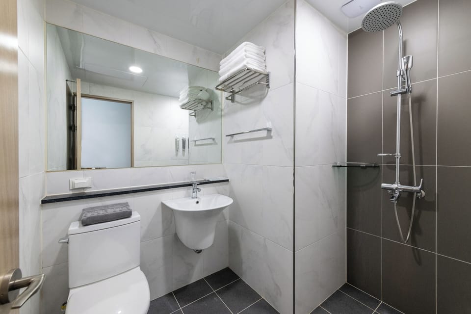 Shower, free toiletries, hair dryer, slippers