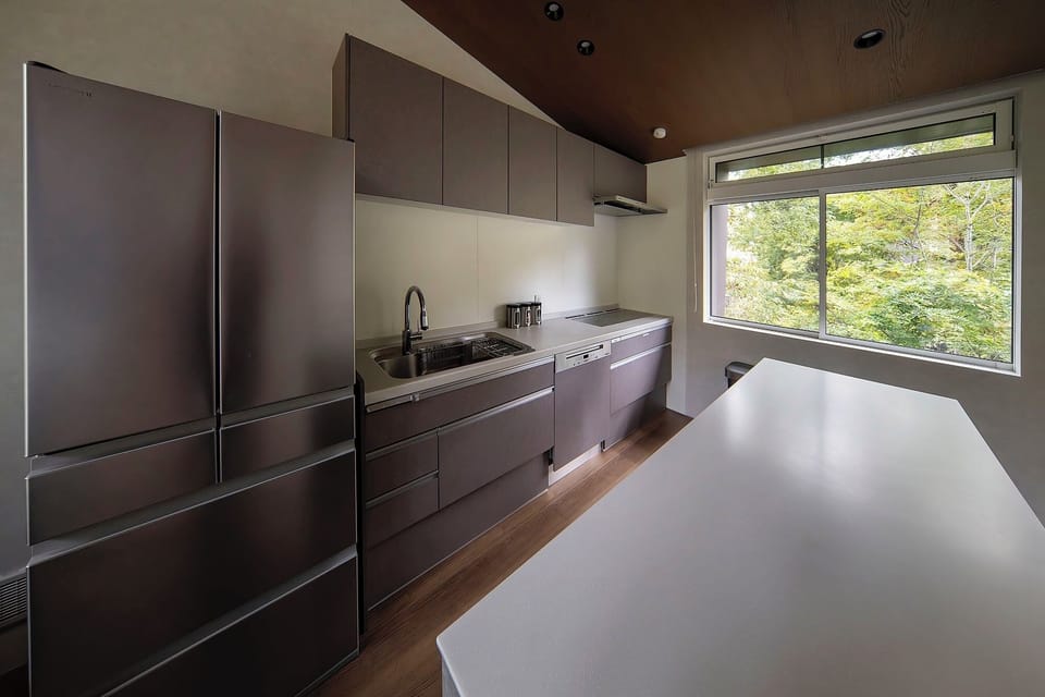 Luxury Chalet | Private kitchen | Full-size fridge, microwave, oven, stovetop
