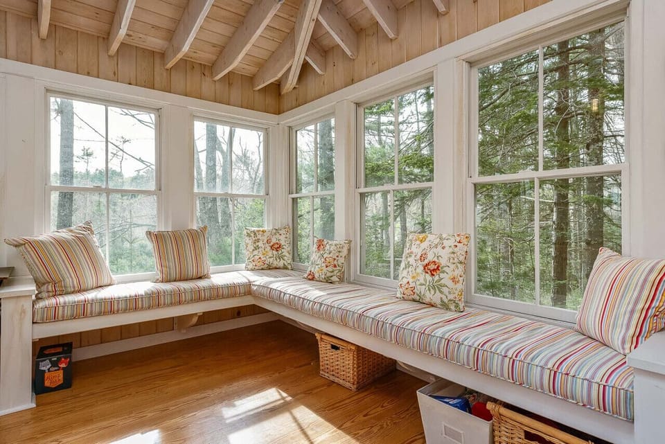 Bench sitting with outside wooded views