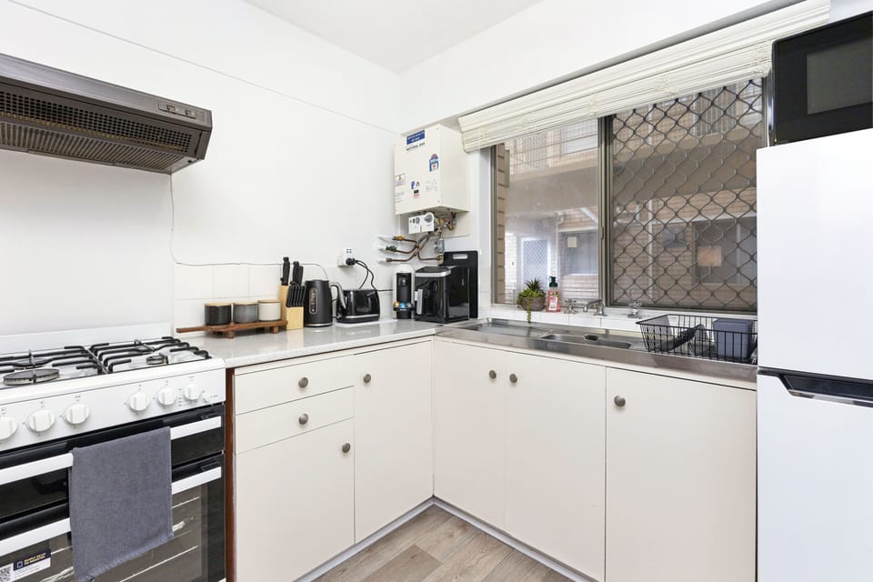 This well-equipped kitchen is ready for culinary adventures! With ample counter space and all the essentials, you'll have everything you need to whip up delicious meals during your stay.