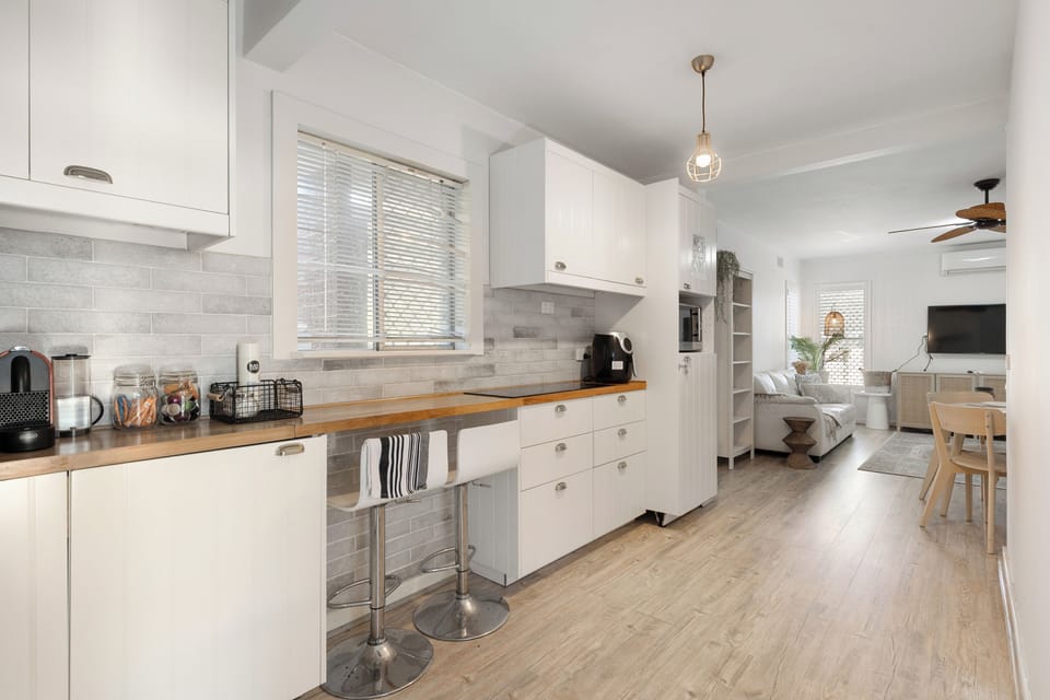 From sunrise coffees to cozy nights, this open-plan space offers comfort and style in every moment.