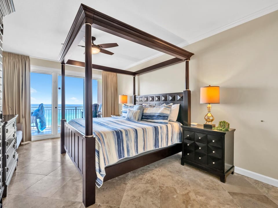 Wake up to stunning ocean views in your elegant four-poster bedroom, where coastal breezes and turquoise waters create the perfect seaside escape.