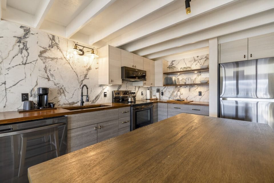 Large kitchen with island seating for 4