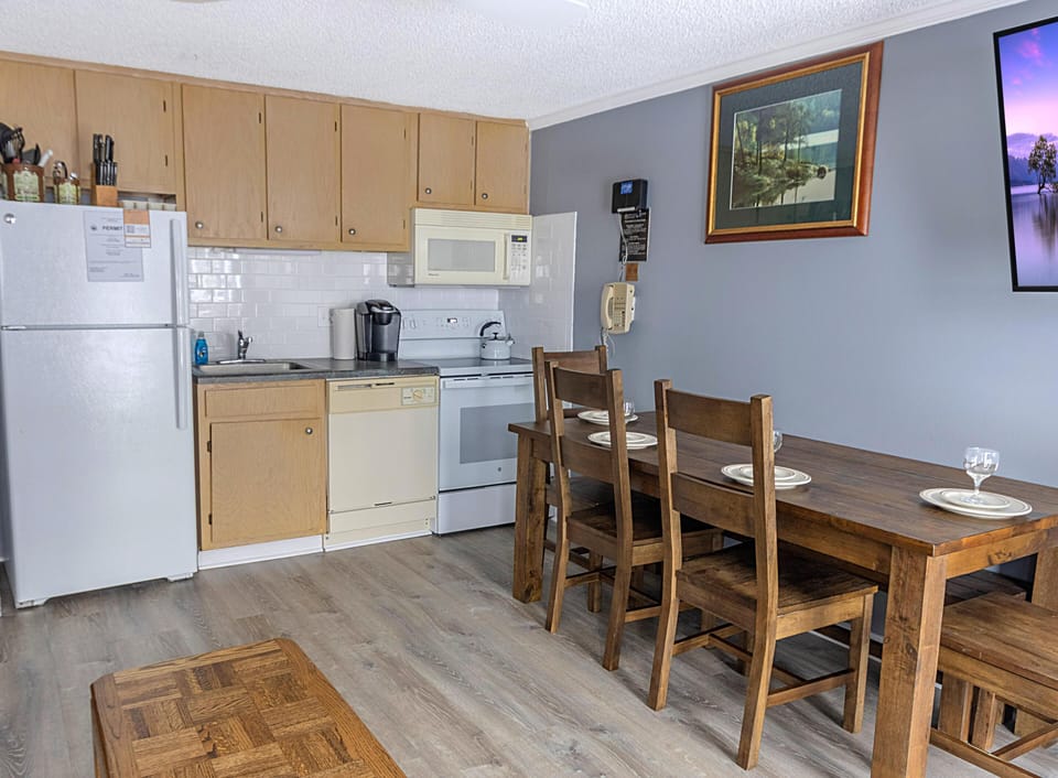 The dining table, with seating for six, is a great place to gather with your group for meals!