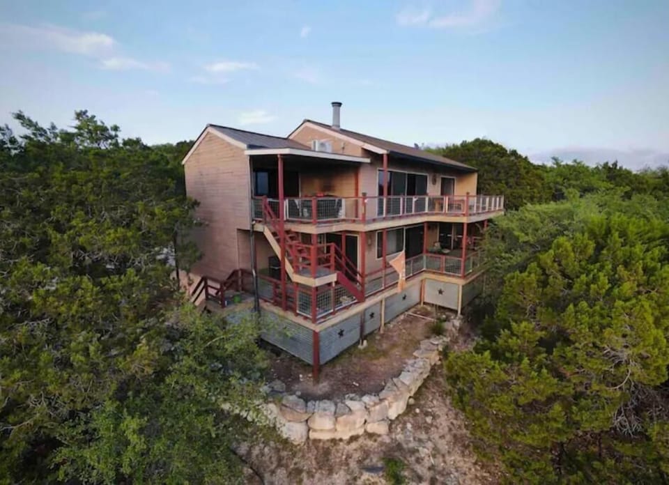 Wow...outdoor decks on both levels from one end of the house to the other 
