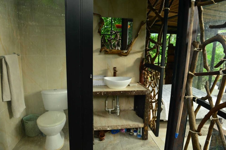 Luxury Cabin | Bathroom | Rainfall showerhead, towels, soap