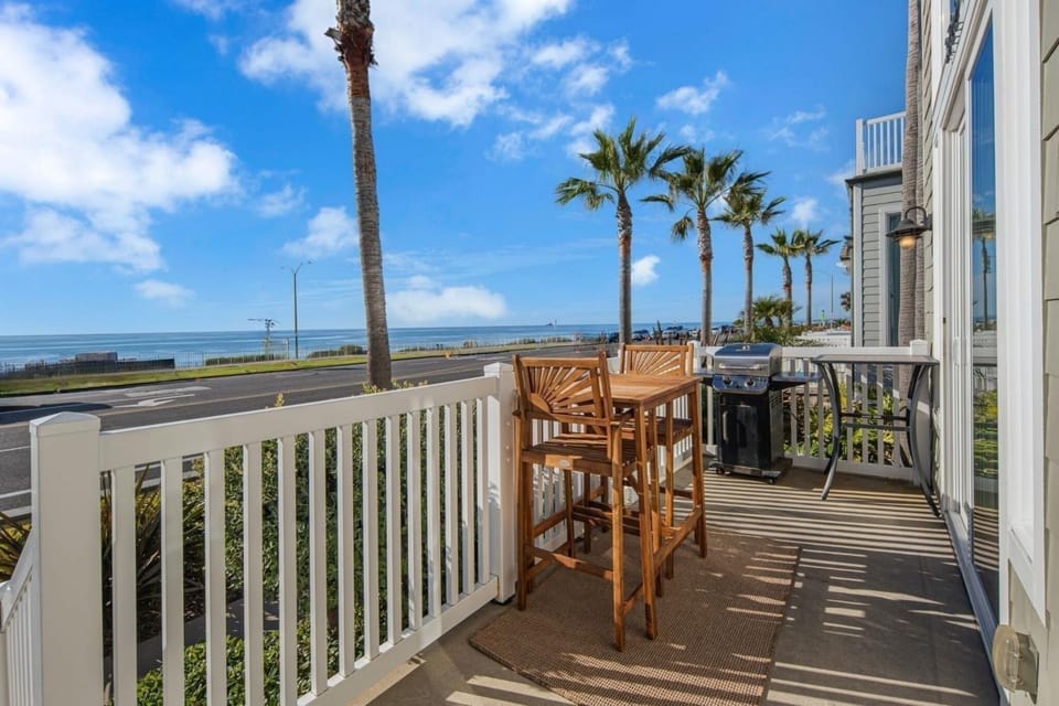 Enjoy endless Pacific Ocean views from the front porch while grilling on the BBQ—perfect for relaxing, dining, and soaking in the coastal scenery.