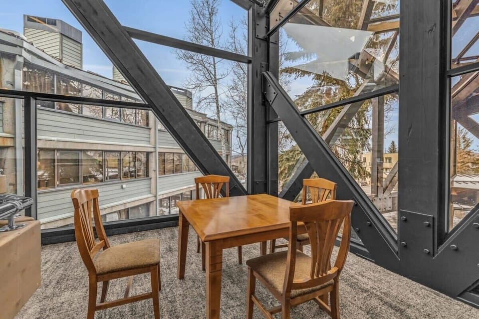 Large windows fill the main lobby area with ample natural light providing great views of the surrounding nature.
