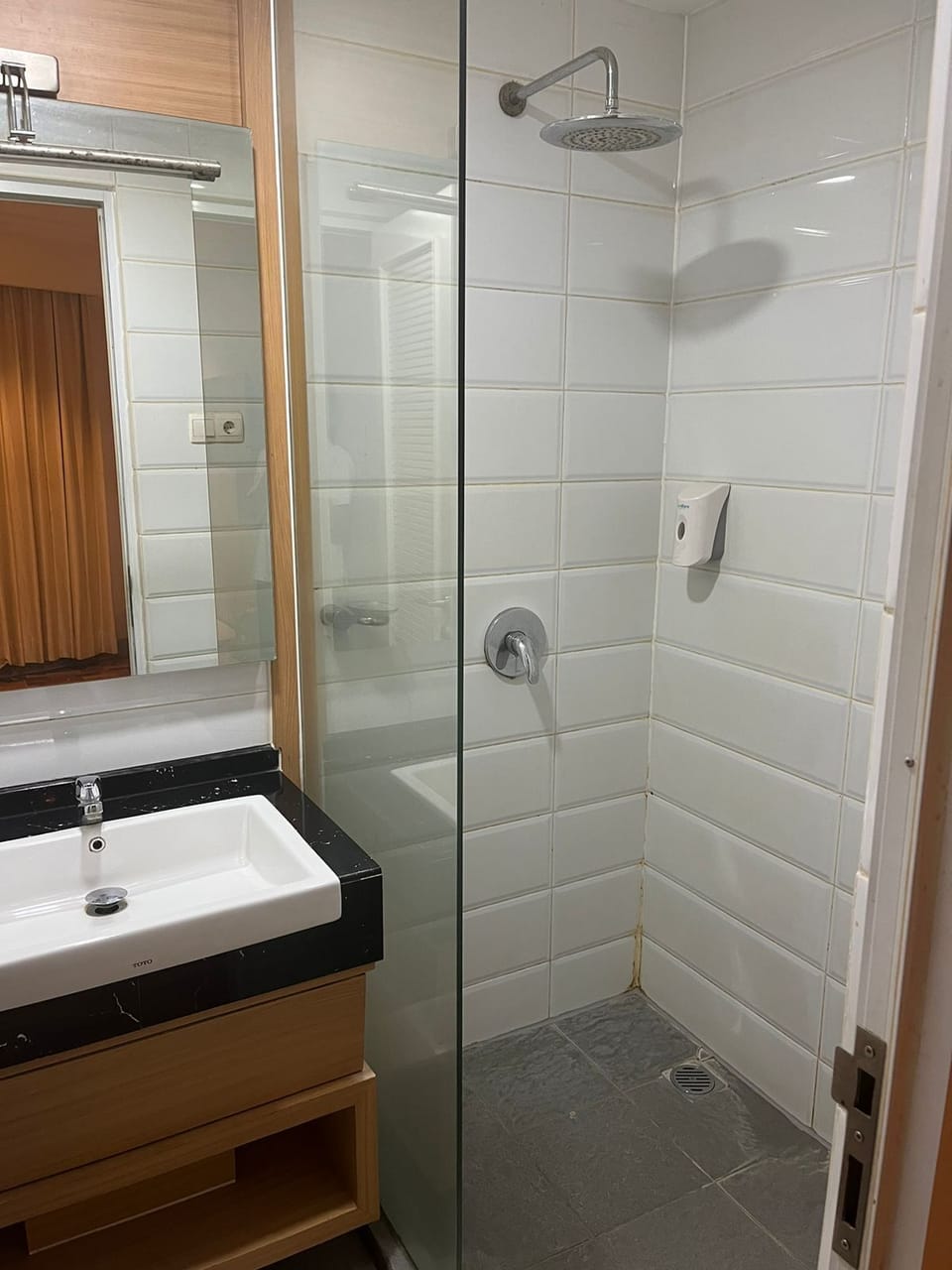 Shower, slippers, towels, soap