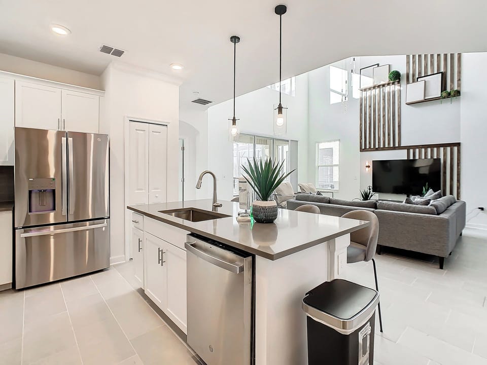 Modern Kitchen with Island Overlooking Open Living Space