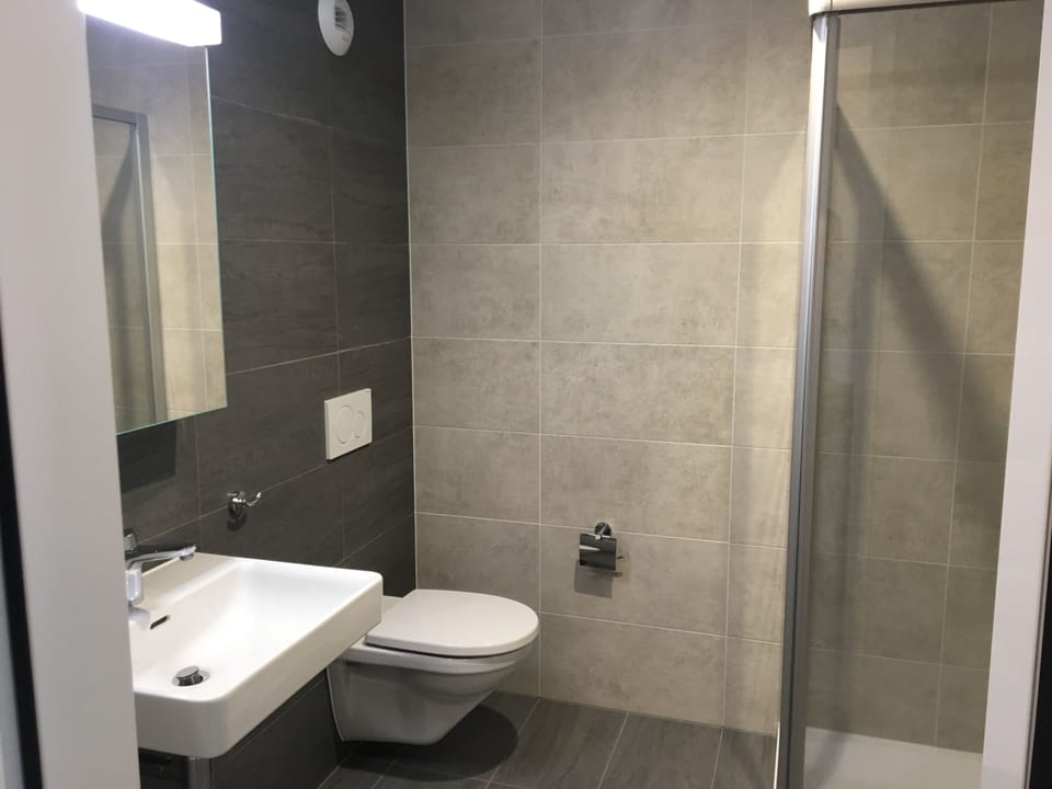 Shower, hair dryer, slippers, heated floors