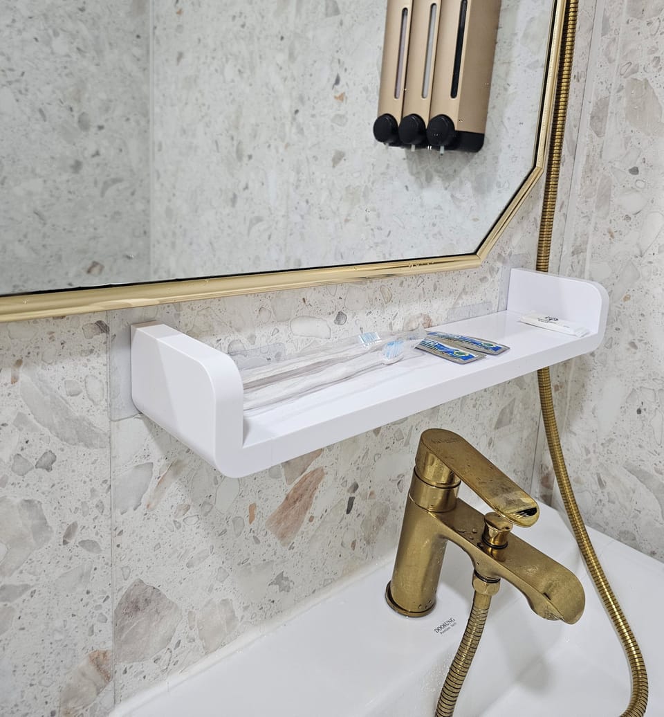 Shower, free toiletries, hair dryer, slippers