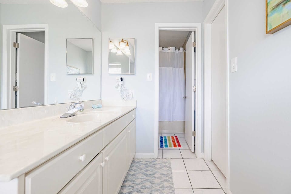 Primary Bath with walk-in closet, deep Jacuzzi tub & shower