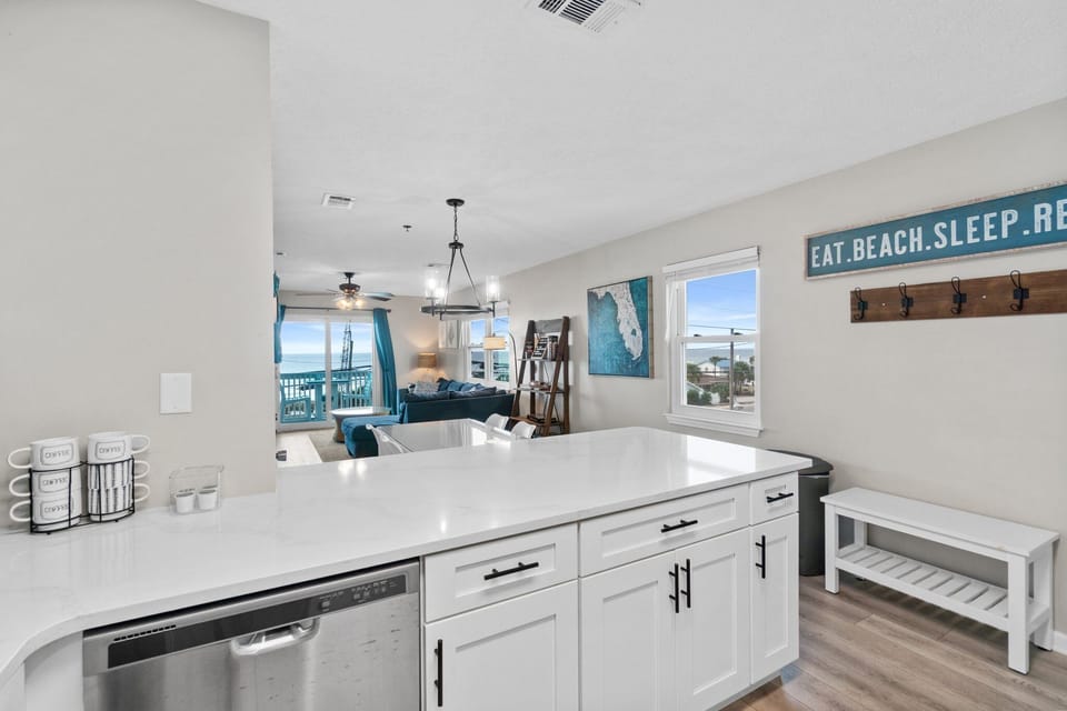 Large peninsula counter overlooking the living and dining areas