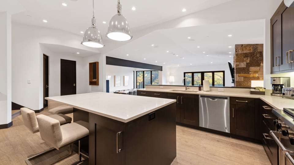 Kitchen, Main Level - Island with seating and pendant lighting