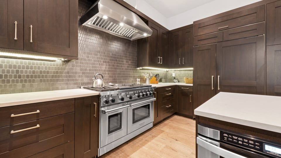 Kitchen, Main Level - Range with tile backsplash