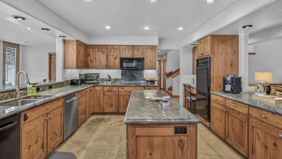 Kitchen, Main Level - Island with surrounding cabinetry