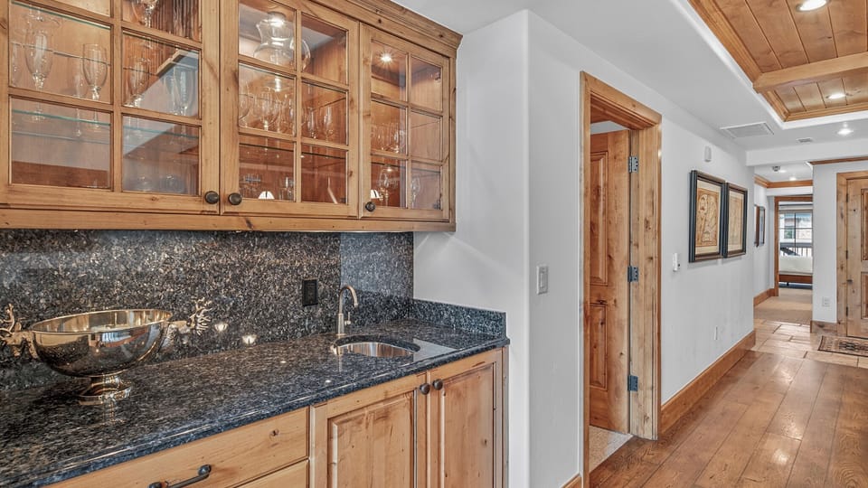Kitchen, Main Level - Wet bar with cabinets and sink