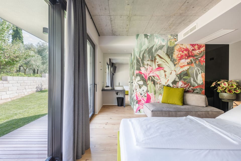 Superior Triple Room, Garden View | Down comforters, minibar, in-room safe, individually furnished