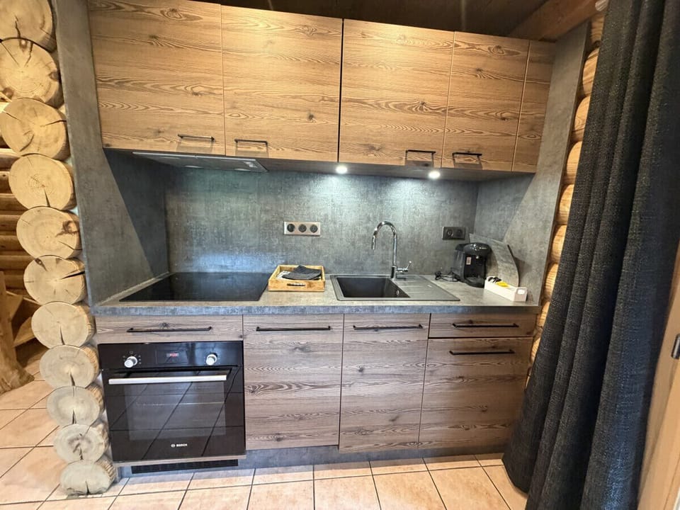 Living room with equipped kitchen