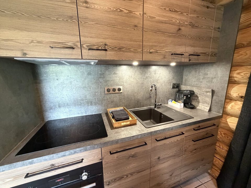 Living room with equipped kitchen