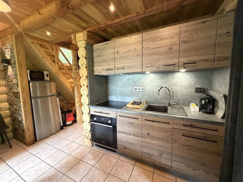 Living room with equipped kitchen