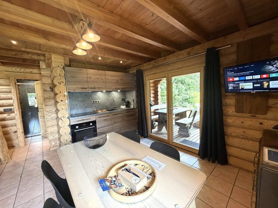 Living room with equipped kitchen