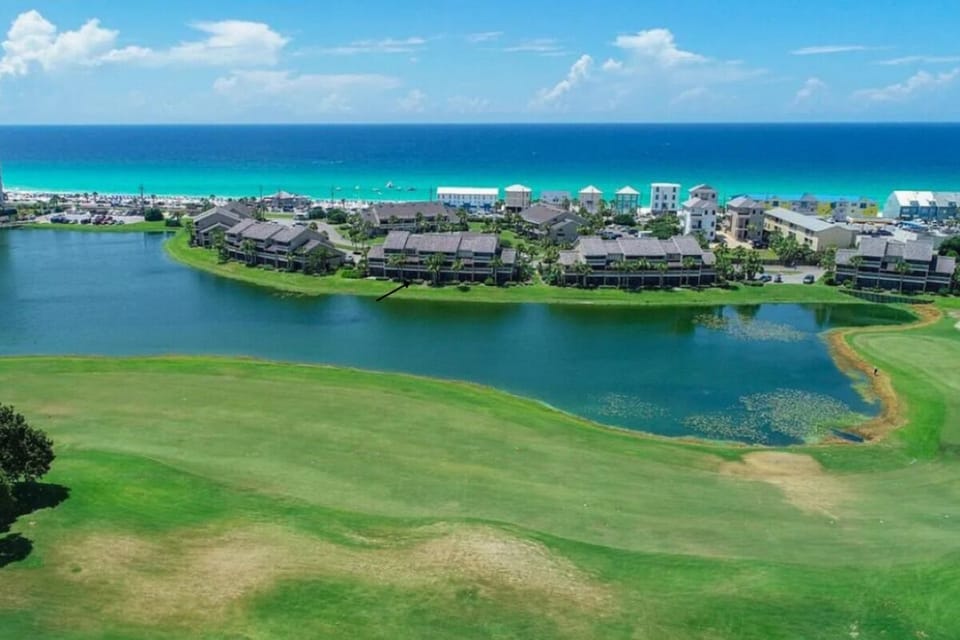 Scenic views of the lake, golf course, and Emerald Coast create the perfect backdrop for your beach getaway.