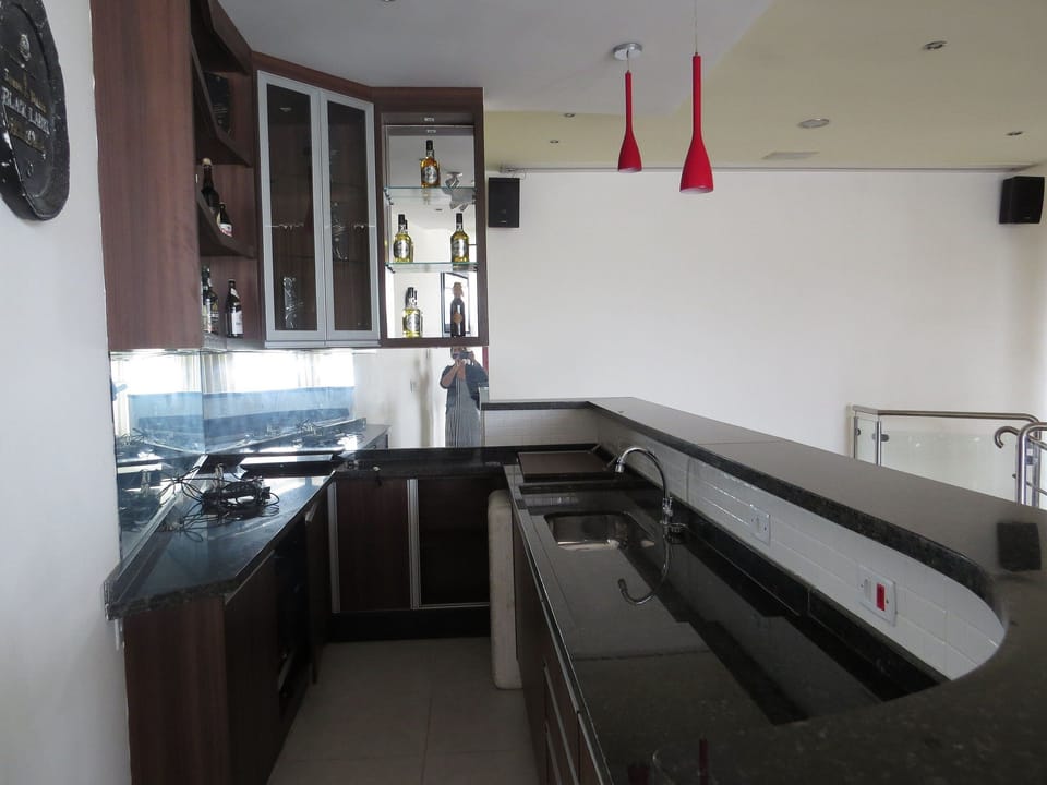 Deluxe Villa | Private kitchen | Full-size fridge, microwave, rice cooker, blender