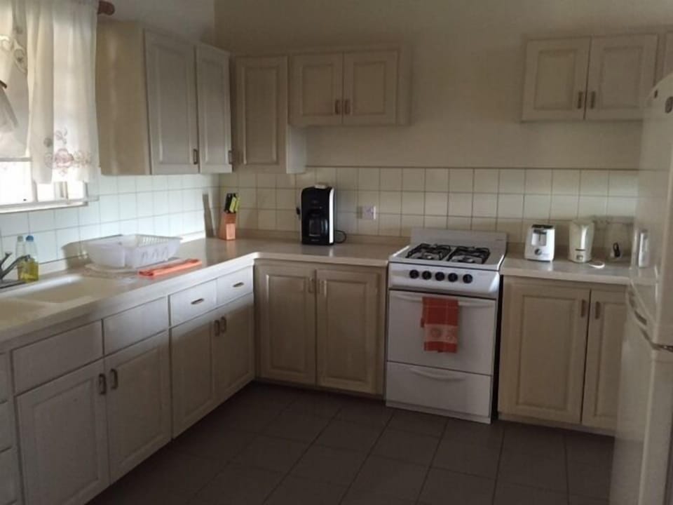 Full-size fridge, microwave, stovetop, coffee/tea maker