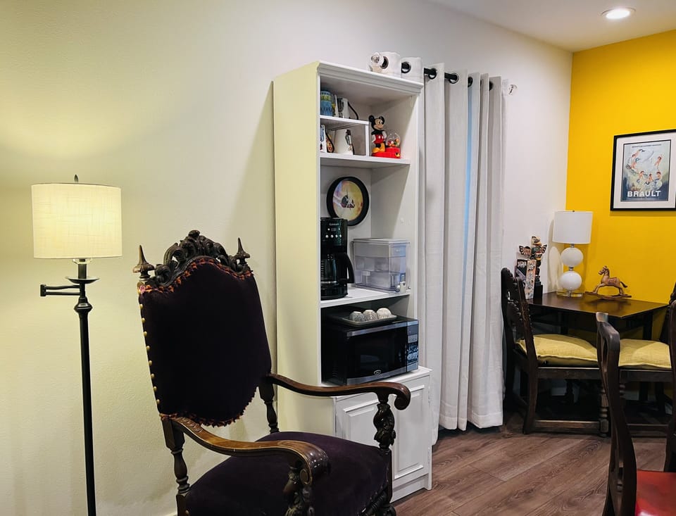 Velvet celebratory throne, coffee station and puzzle table.
