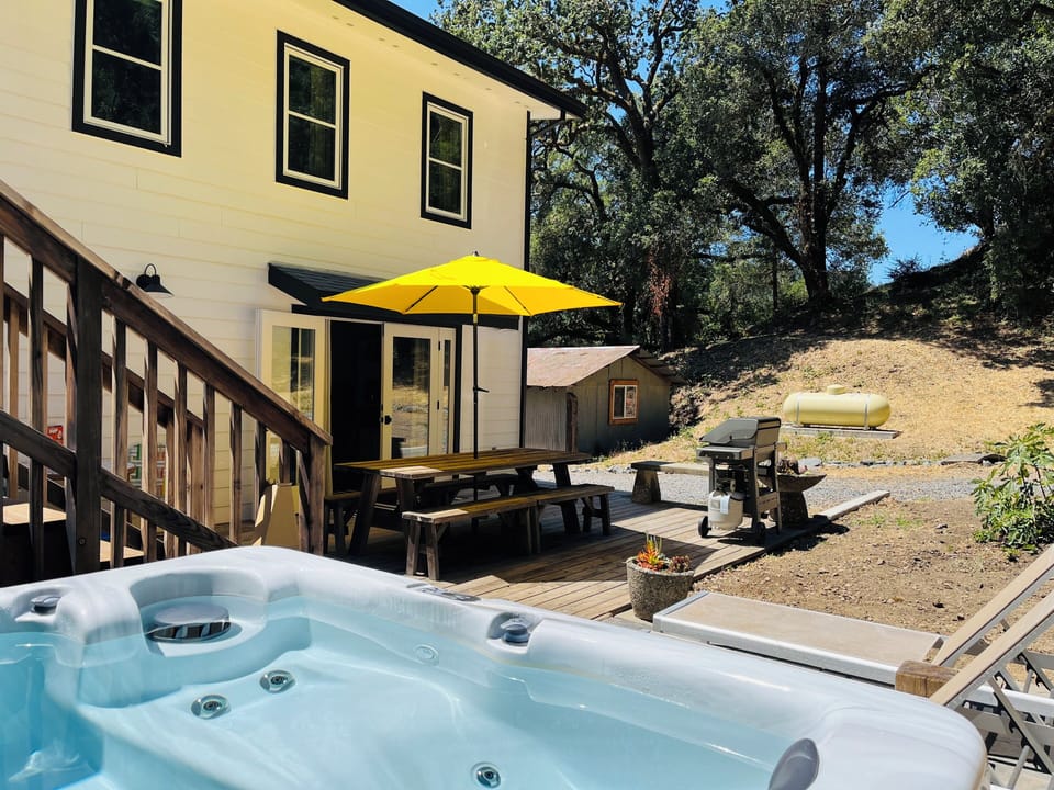 Enjoy a soak in the hot tub located in private back yard area.