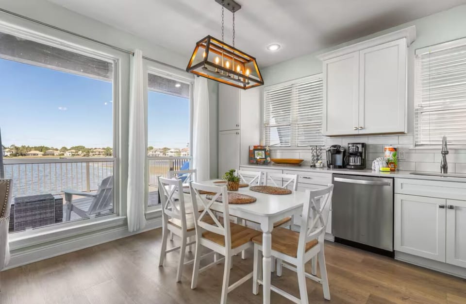 Dine with a view in the bright , airy dining area overlooking the tranquil lake.