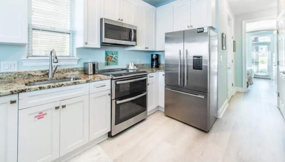 Spacious kitchen and modern appliances 