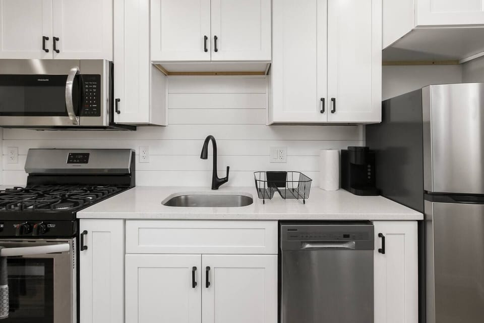 Get the look of Baltimore's charm in your kitchen with this custom-crafted shiplap backsplash. Create a space that speaks to you and your home's character! #BacksplashShiplap #BaltimoresCharm