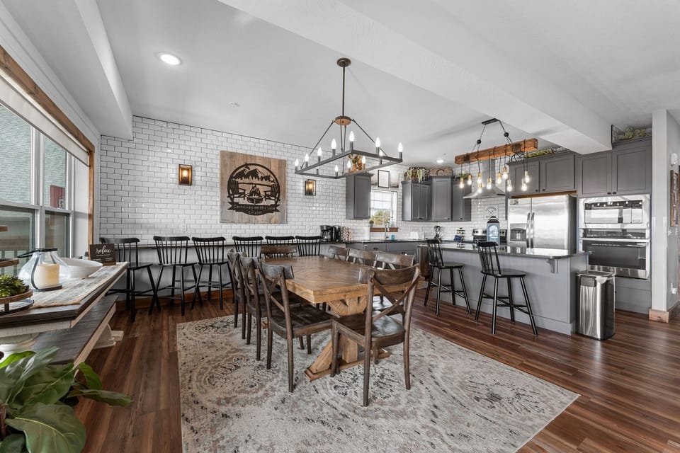 Full Kitchen, Dining Area with Dining Table and Bar Seating