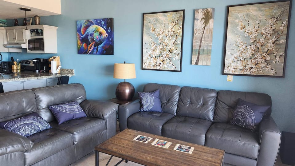 Living room with comfortable seating and Smart-TV