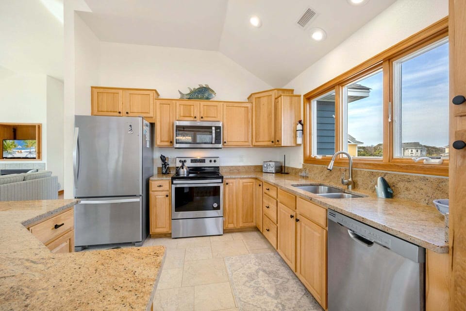Whip up something delicious in the Modern Kitchen to enjoy at the Counter Bar or the Dining Area.
