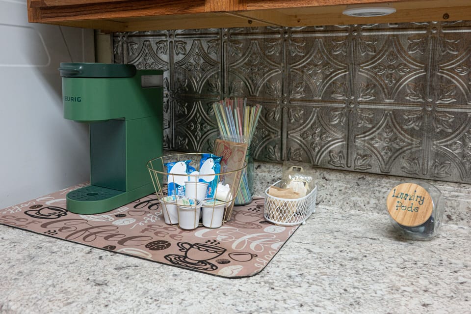 Complimentary snacks and coffee pods. We also have a full coffee pot and ground coffee for larger groups of guests. 